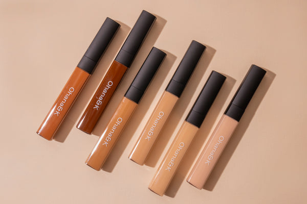 Ohana&K Concealer in all six shades, displayed in a natural setting, suitable for diverse skin tones.