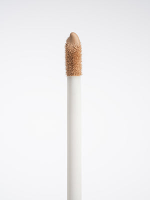 Close-up of Ohana&K concealer applicator with smooth, blendable formula for precise under-eye and spot coverage.