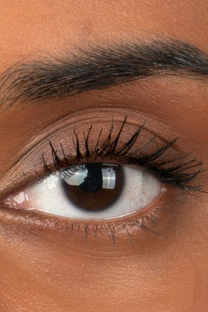 Close-up of eye with Ohana&K Vegan and Cruelty-Free Waterproof Mascara applied, showcasing bold volume and length.